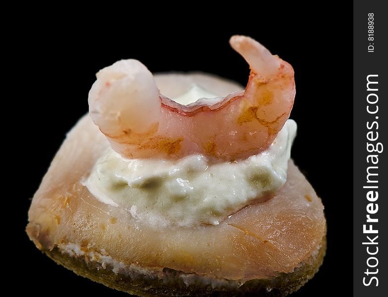 Shrimp on a small bread with cream. Shrimp on a small bread with cream