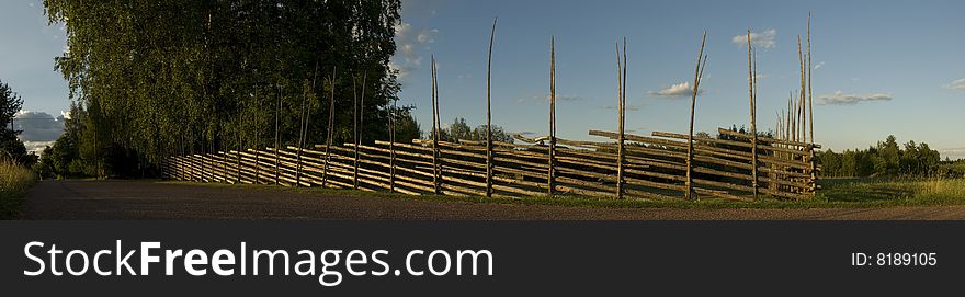 Sunset on wooden fence
