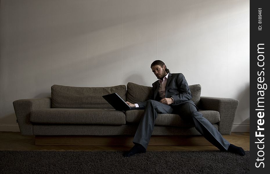 Clean composition at a business working in a sofa. Clean composition at a business working in a sofa.