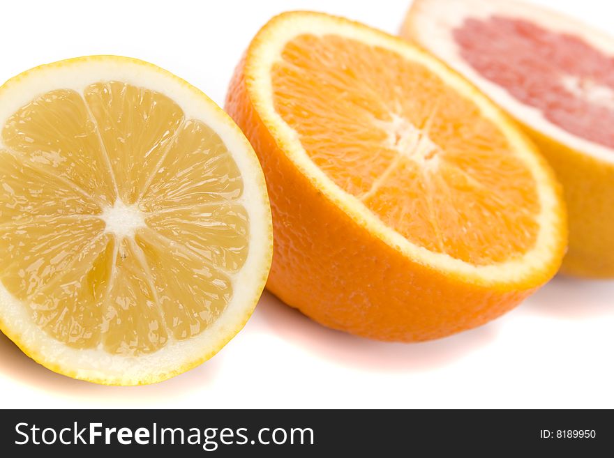 Slices of an lemon, orange and grapefruit closeup