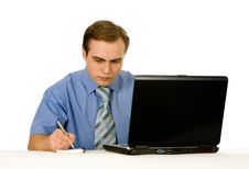 Businessman Working On Laptop. Isolated On White. Stock Photos Businessman Working On Laptop. Isolated On White. Stock Photos