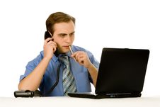 Businessman Working On Laptop. Isolated On White. Stock Photos Businessman Working On Laptop. Isolated On White. Stock Photos