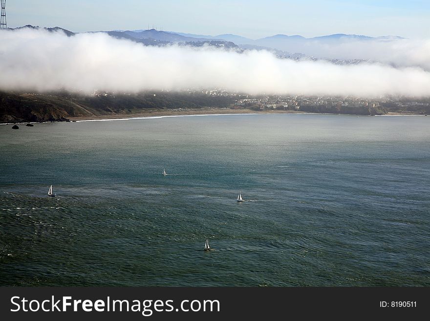 Fog is rolling in San Francisco bay.