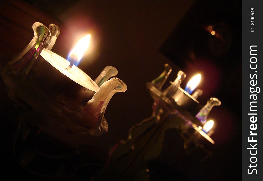 Detail of candelabrum and candles. Detail of candelabrum and candles