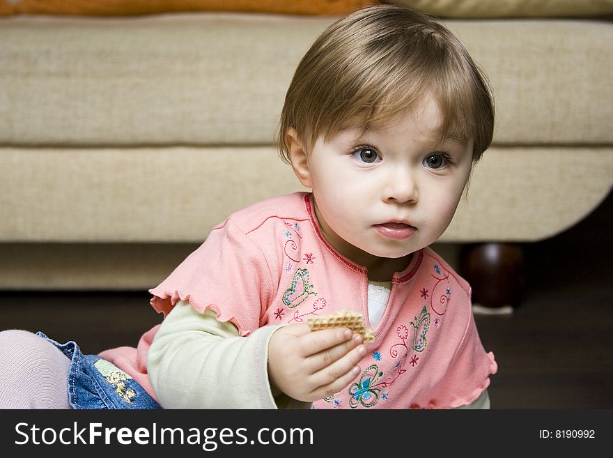 Sweet  toddler baby girl eating. Sweet  toddler baby girl eating