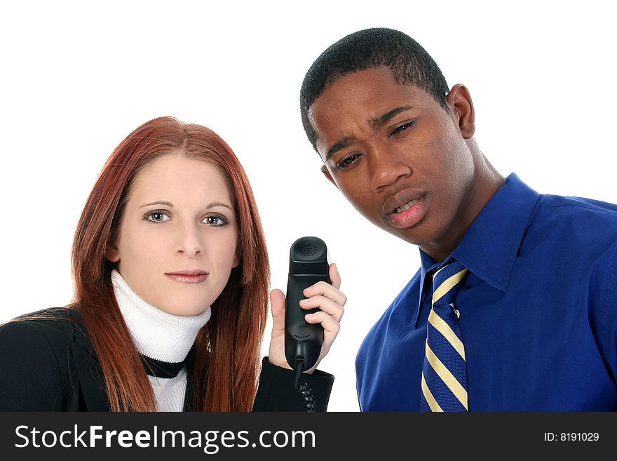 Attractive Interracial Couple Sharing Cellphone over white background.