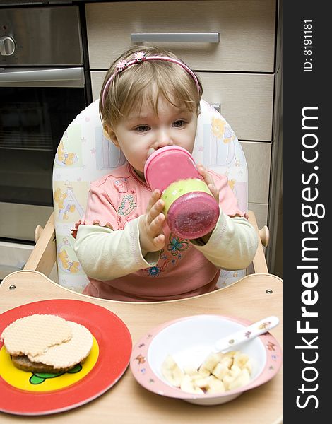 Sweet toddler baby girl eating. Sweet toddler baby girl eating