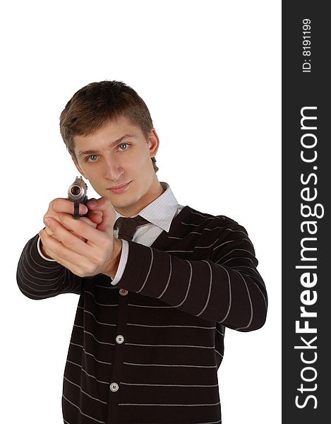 Young man aiming with a gun. Isolated