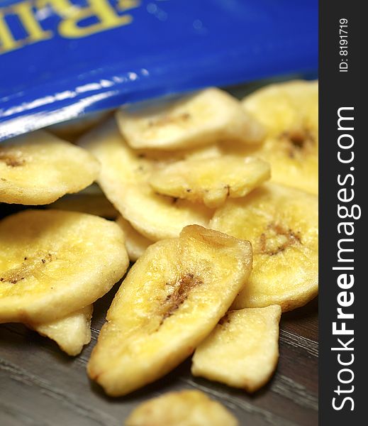 Staying on a diet is tough. Why not snack on a healthy alternative to potato chips. Closeup shot of banana chips. Staying on a diet is tough. Why not snack on a healthy alternative to potato chips. Closeup shot of banana chips.