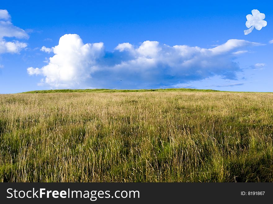 Rural landscape with a blue sky and a shamrock cloud. Ireland. Rural landscape with a blue sky and a shamrock cloud. Ireland