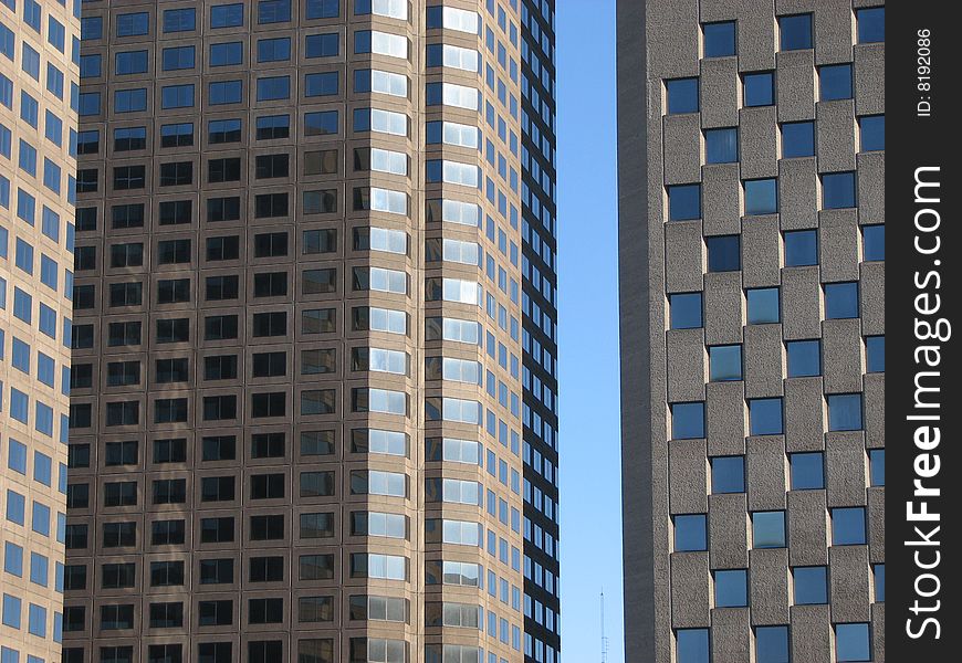 In Montreal, Quebec, Canada, two buildings close to each other. Very few space to breath and to see the sky. In Montreal, Quebec, Canada, two buildings close to each other. Very few space to breath and to see the sky.