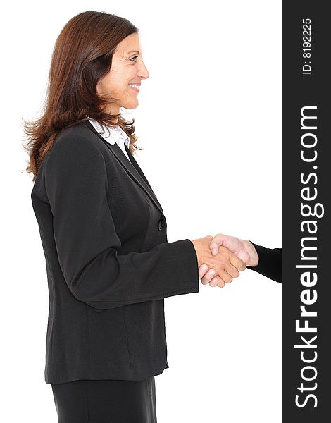 Business woman shaking hands after achieving an agreement