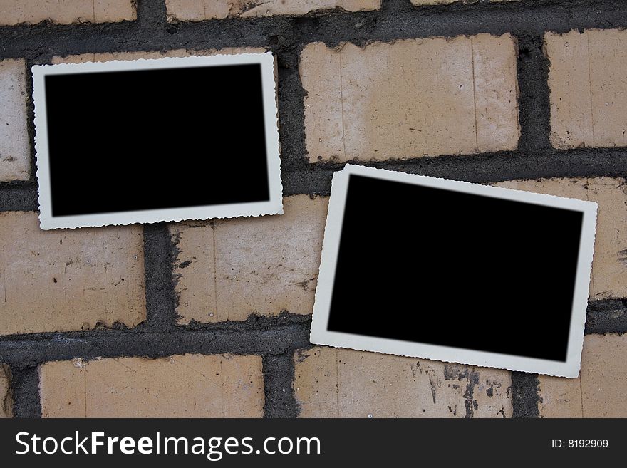 Photoframe of an empty photo on the brick wall. Photoframe of an empty photo on the brick wall