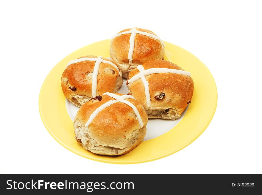 Four hot cross buns on a plate. Four hot cross buns on a plate