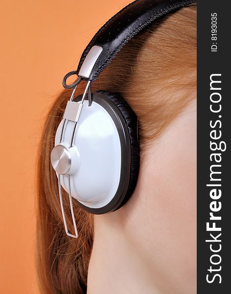 Woman In Headphones Close-up