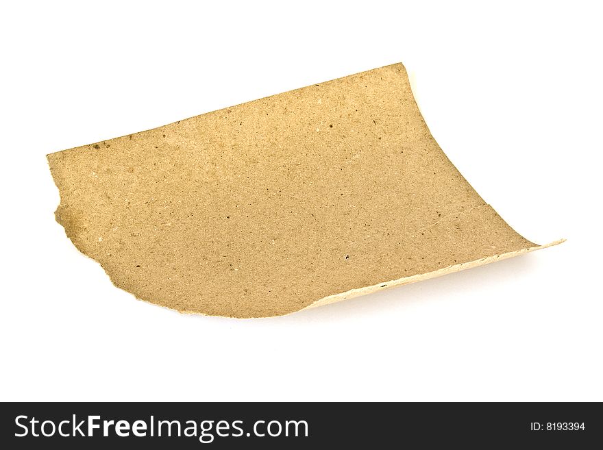 Scrap of kraft paper isolated on white background