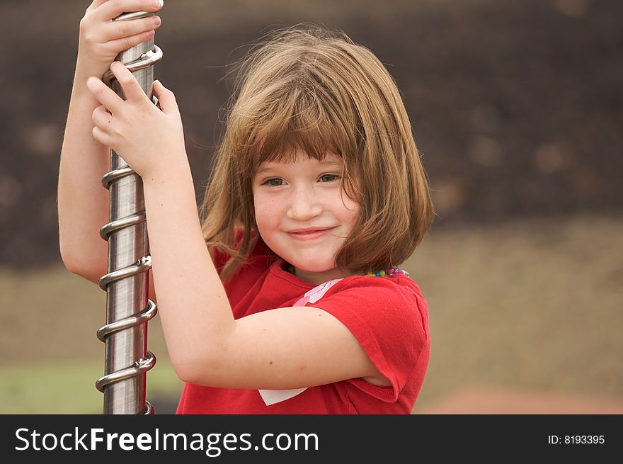 Adorable Young Girl At The Park