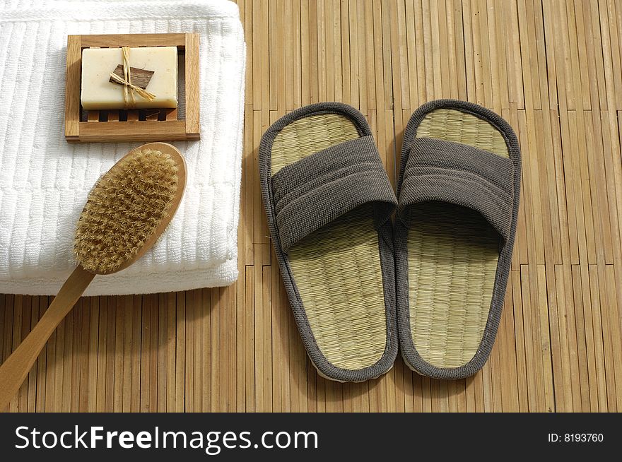 Bath accessories on the bamboo mat