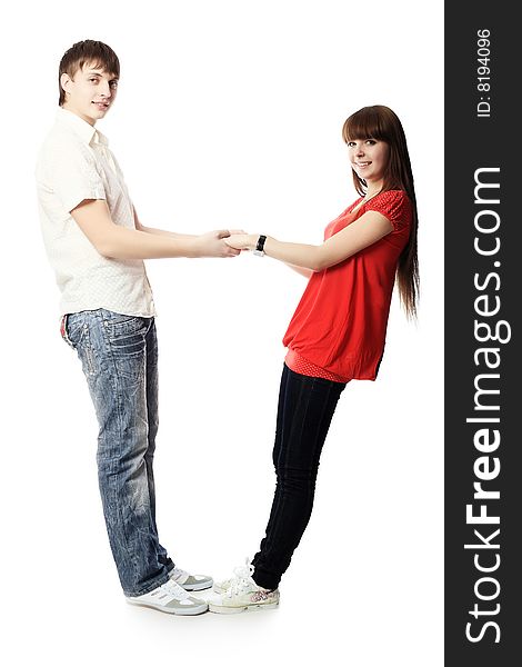 Portrait of young people in love. Shot in a studio. Portrait of young people in love. Shot in a studio.