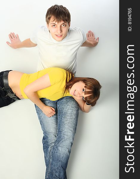 Portrait of young people in love. Shot in a studio. Portrait of young people in love. Shot in a studio.