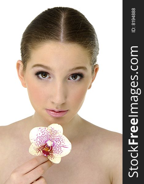 Closeup portrait of a beautiful girl with orchid. Closeup portrait of a beautiful girl with orchid