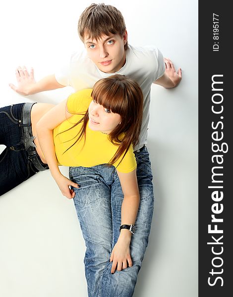 Portrait of young people in love. Shot in a studio. Portrait of young people in love. Shot in a studio.