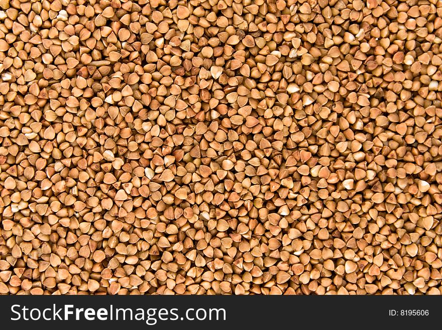 Background from raw graine buckwheat. Background from raw graine buckwheat.