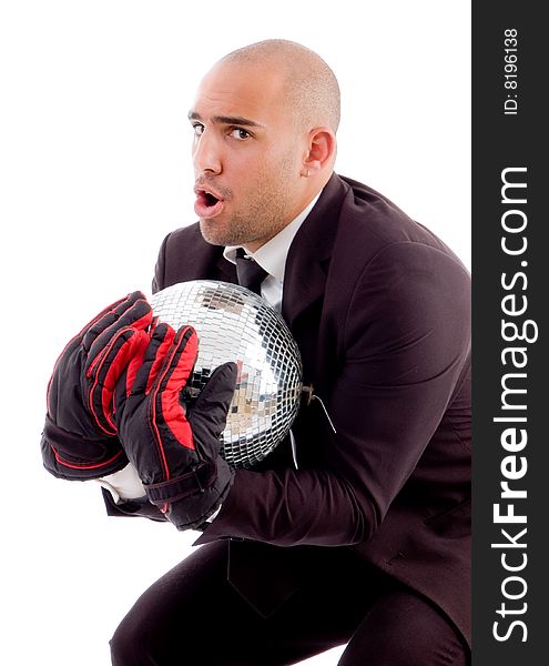 Bald male holding disco mirror ball with white background