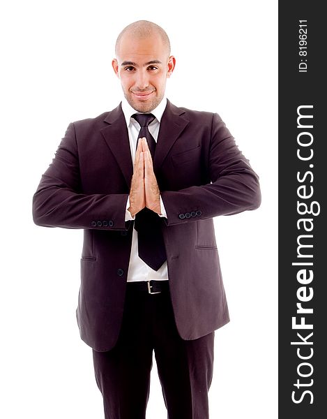 Businessman standing joining both hands against white background