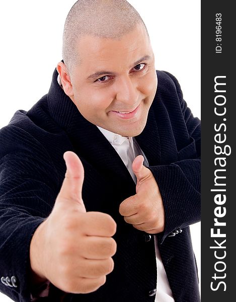 Good looking mature accountant with thumbs up against white background