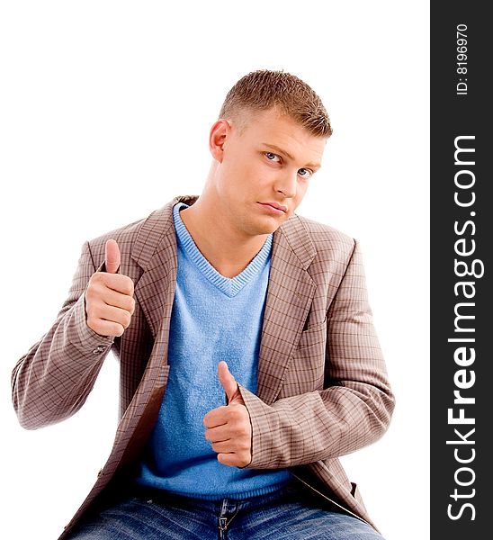 Handsome male showing thumbs up on an isolated white background