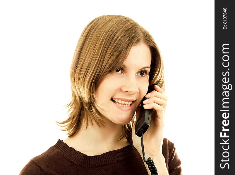 Beautiful girl talking on the phone; isolated on white