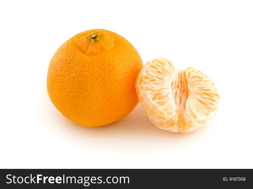 Tangerine and a half. Isolated on white background. Tangerine and a half. Isolated on white background