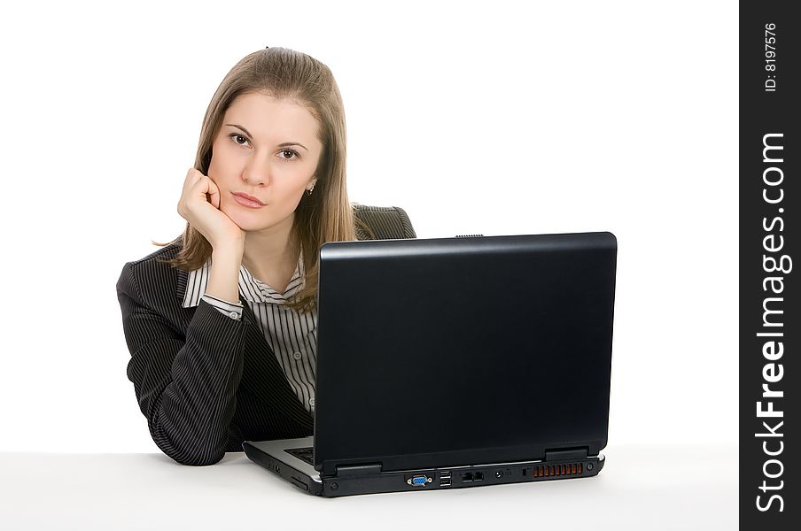 Businesswoman working on a laptop.