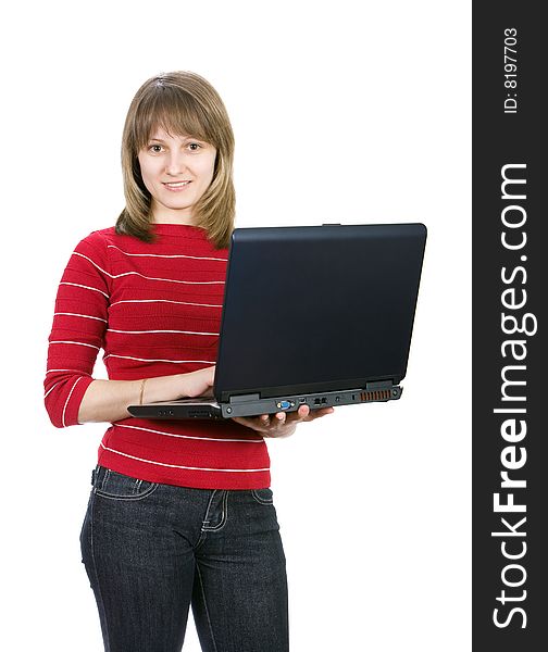 Beautiful casual girl with a laptop. Isolated on white.