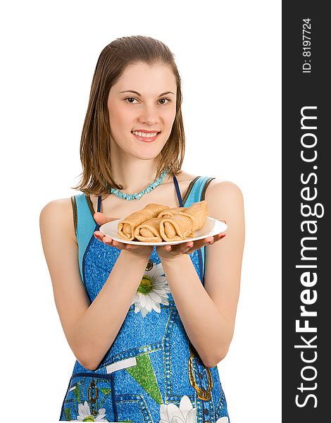 Beautiful girl with a plate of pancakes. Isolated on white.