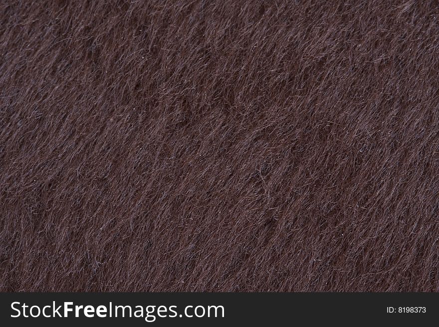 Dark furry background close up