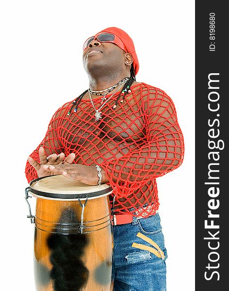 Young handsome cuban man plays on percussion. Young handsome cuban man plays on percussion