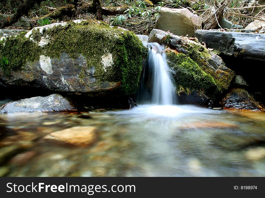 Silky smooth river flowing thru rainforest. Silky smooth river flowing thru rainforest