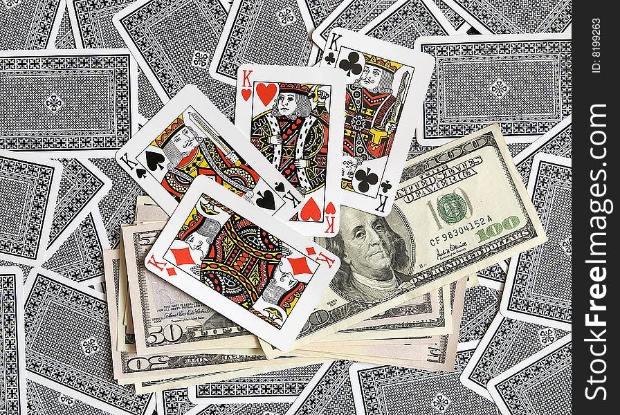 Playing cards and American dollars. Playing cards and American dollars