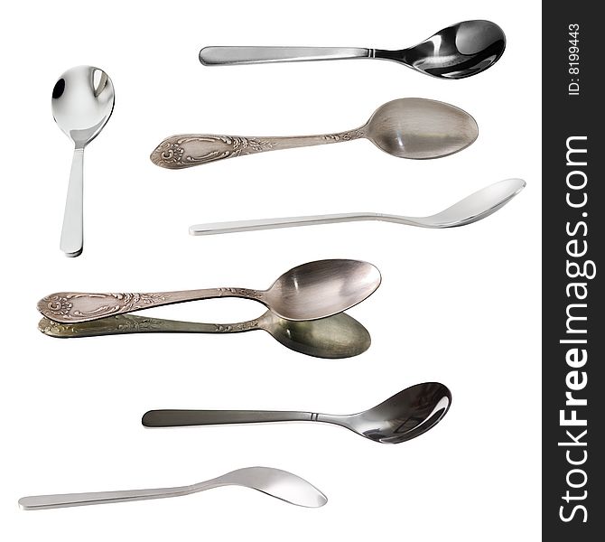 Group Of Teaspoons Isolated Over White