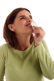 Kissing The Coin Royalty Free Stock Photo