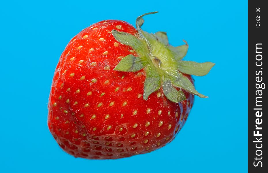 Strawberry on a blue background. Strawberry on a blue background