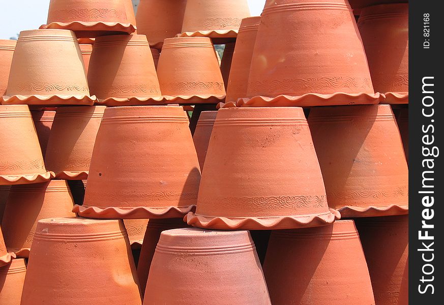 Clay, terra cotta, flower pots, stacked on top of each other. Clay, terra cotta, flower pots, stacked on top of each other