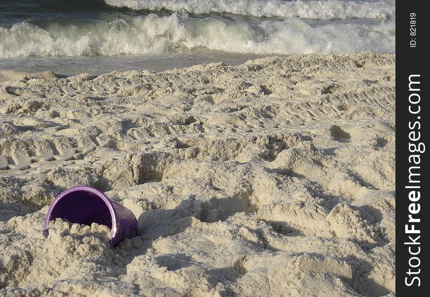 This photo shows an abandon bucket in the sand. This photo shows an abandon bucket in the sand.