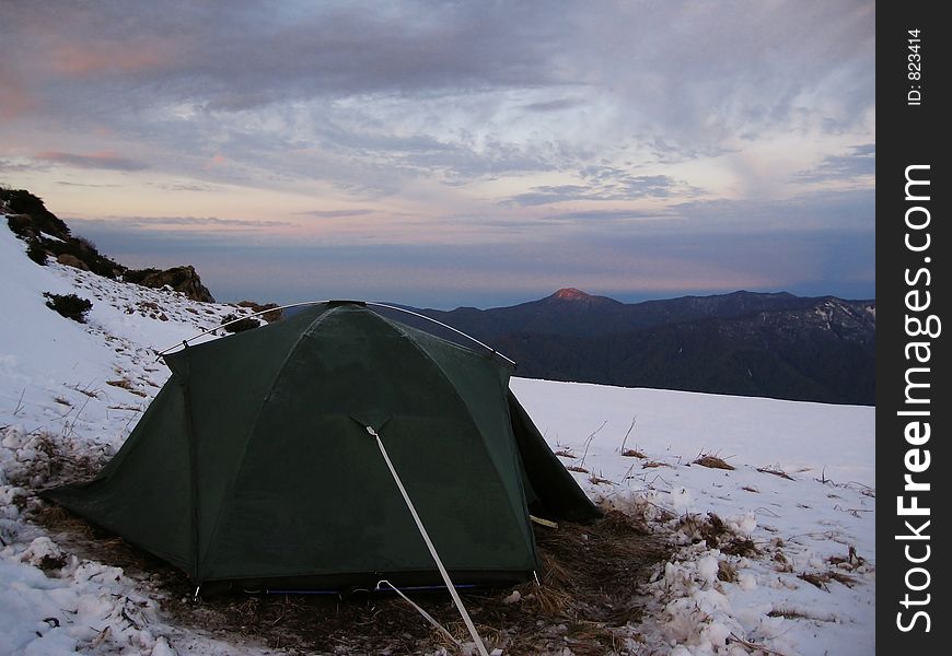 Tent in the sunrice on Caucasus mountains