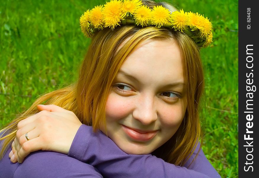 Portrait of the girl in a wreath