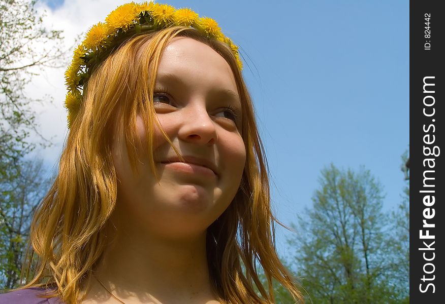 Portrait of the girl in a wreath