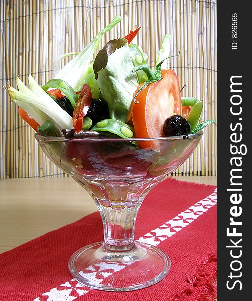 Choice of vegetables served raw in a glass as a summer salad. Choice of vegetables served raw in a glass as a summer salad