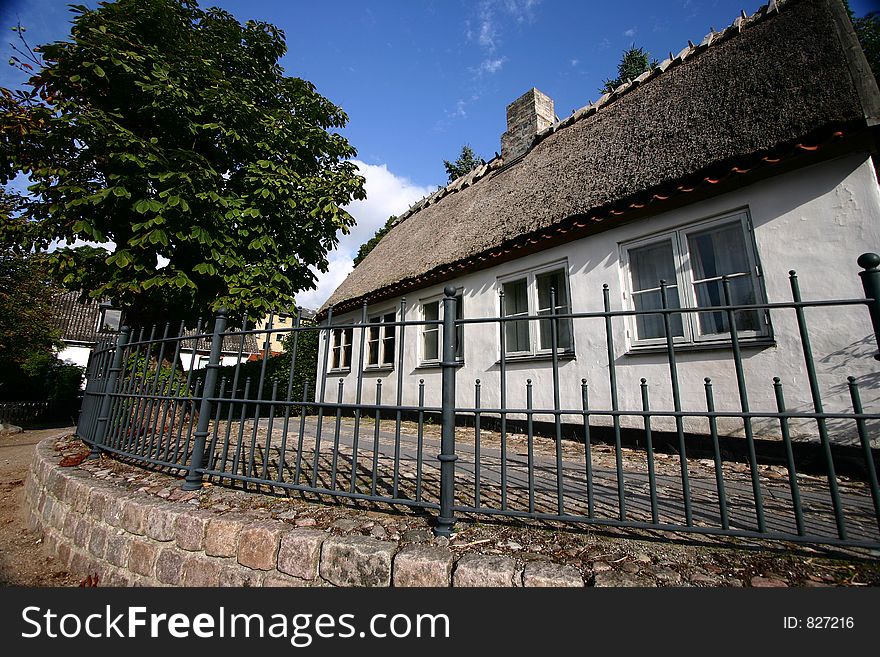Thached roof traditional house in denmark a sunny summer day
